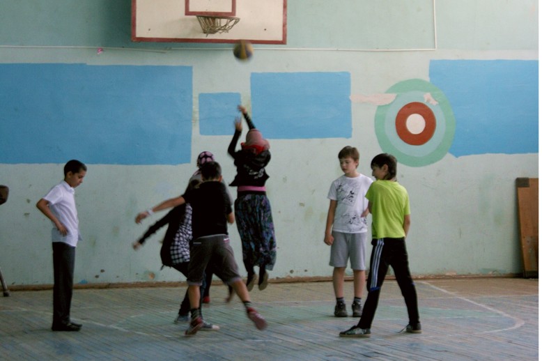 Muslim girls playing basketball